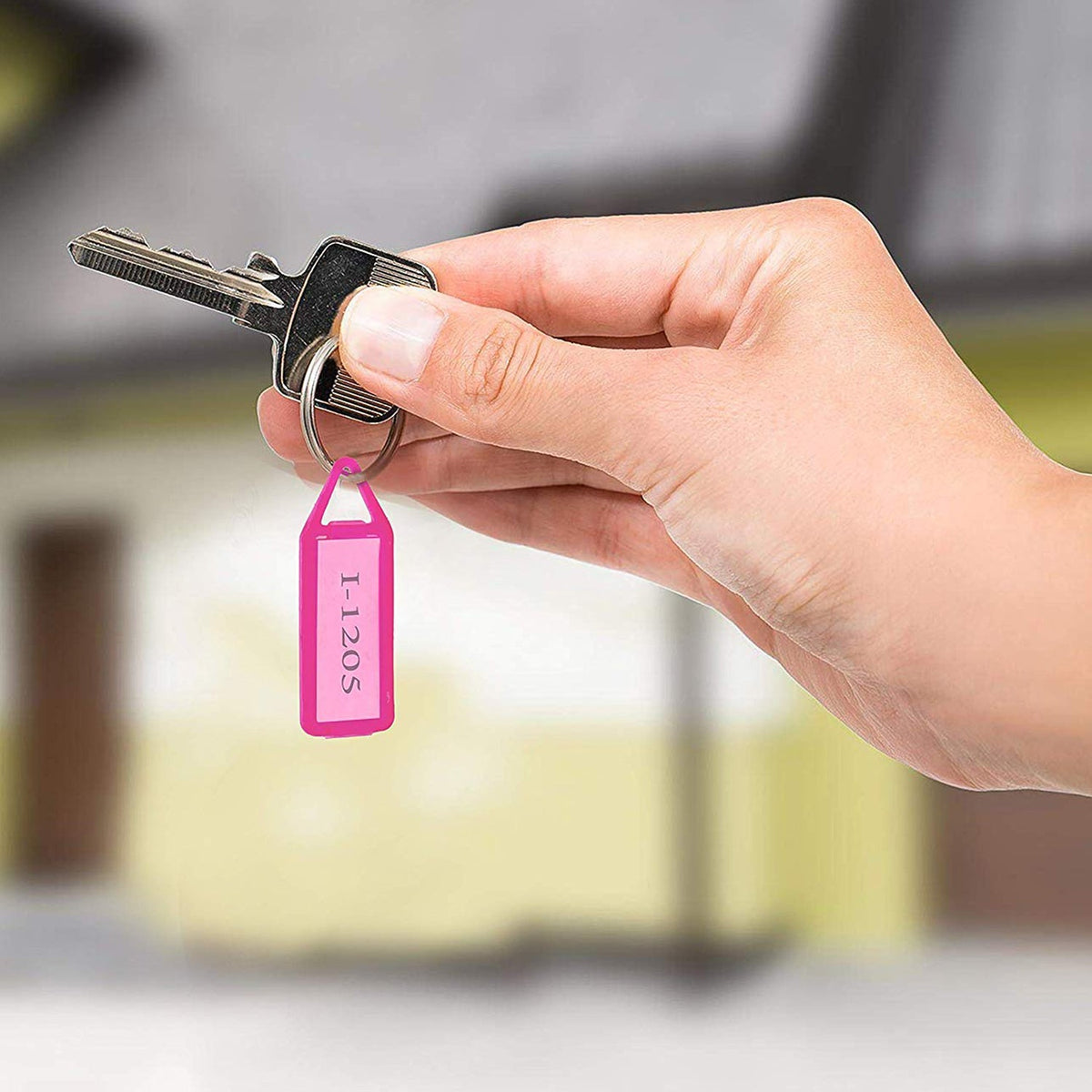 Keychain tag showing paper insert for clear labeling and identification