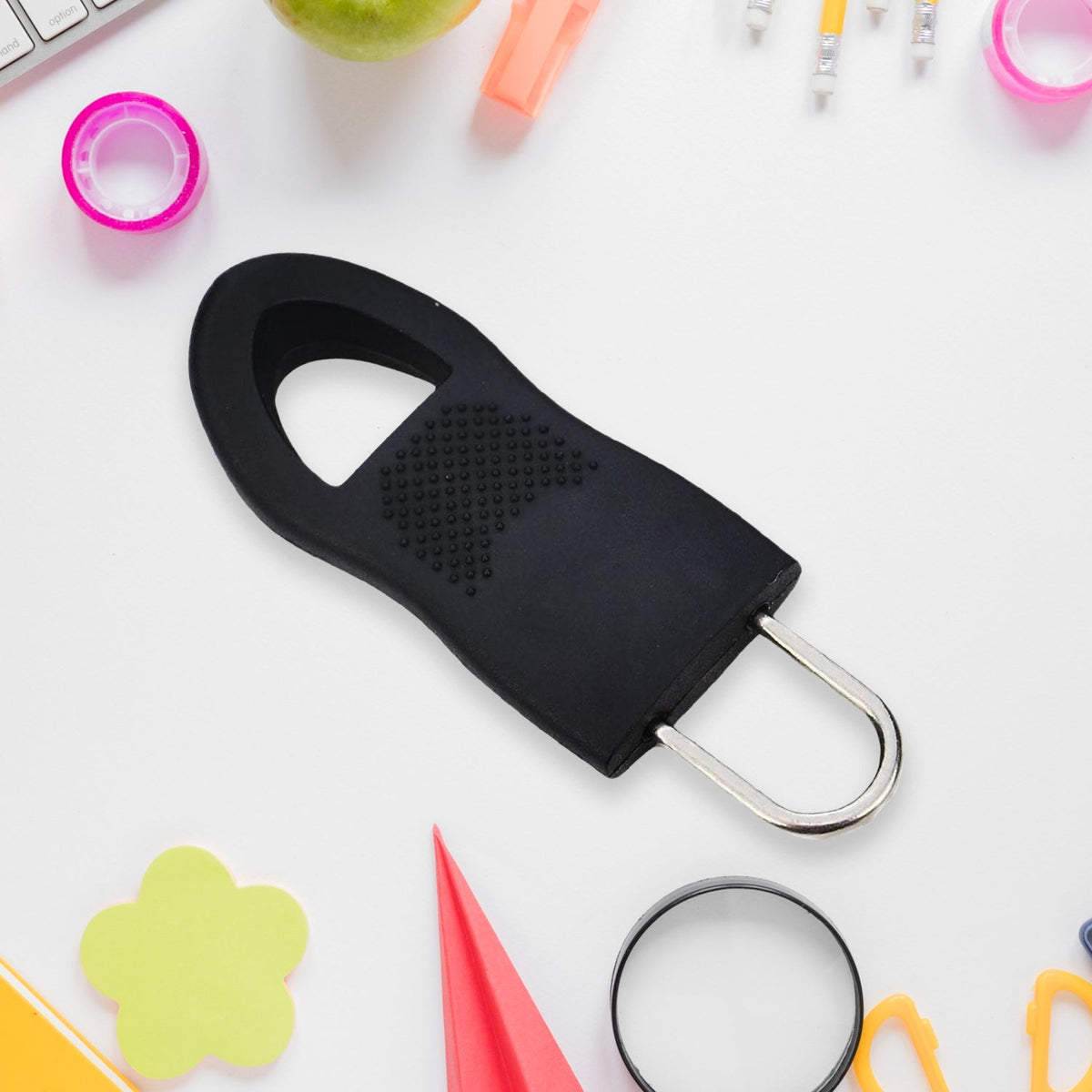Various bags, jackets, and luggage showcasing versatile zipper pull tabs.