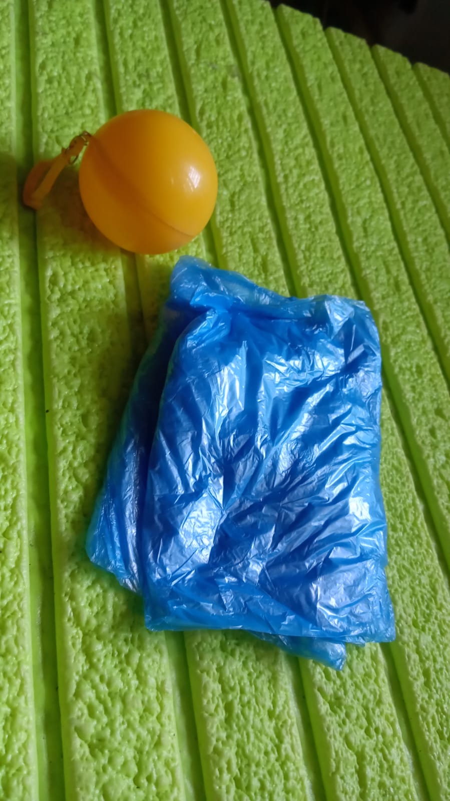 Group of kids wearing disposable clear raincoats with hoods for outdoor activities