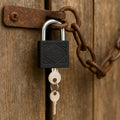 Safelix iron padlock with a brass core, displayed with three keys for enhanced security.
